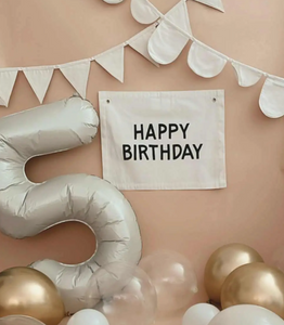 happy birthday banner in natural