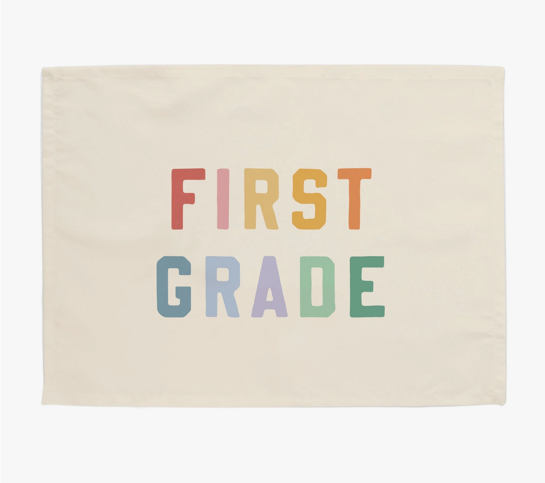 first grade banner in natural