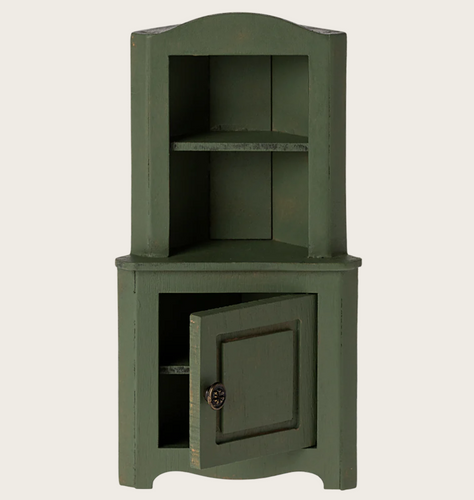 corner cabinet in dark green