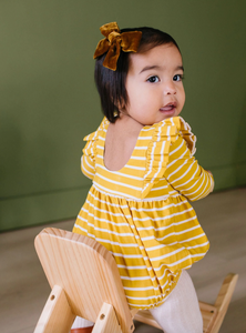 leah romper in mustard stripe