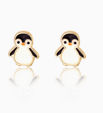 stud earrings: penguins