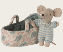 blue baby mouse in carry cot