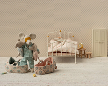 blue baby mouse in carry cot