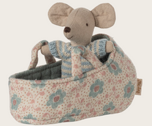 blue baby mouse in carry cot
