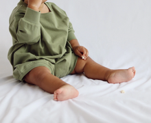 pocket romper in forest green