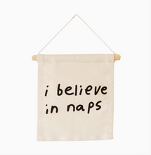 'i believe in naps' wall hanging