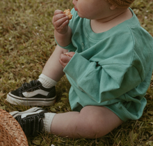 pocket romper in mineral green