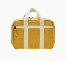 the lunchbox in yellow