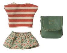 clothes and green bag