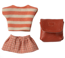 clothes and coral bag