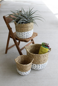 gray and white dotted seagrass baskets
